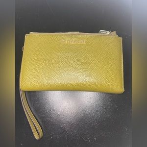 Michael Kors forest green wallet. Slightly used with original price tag.